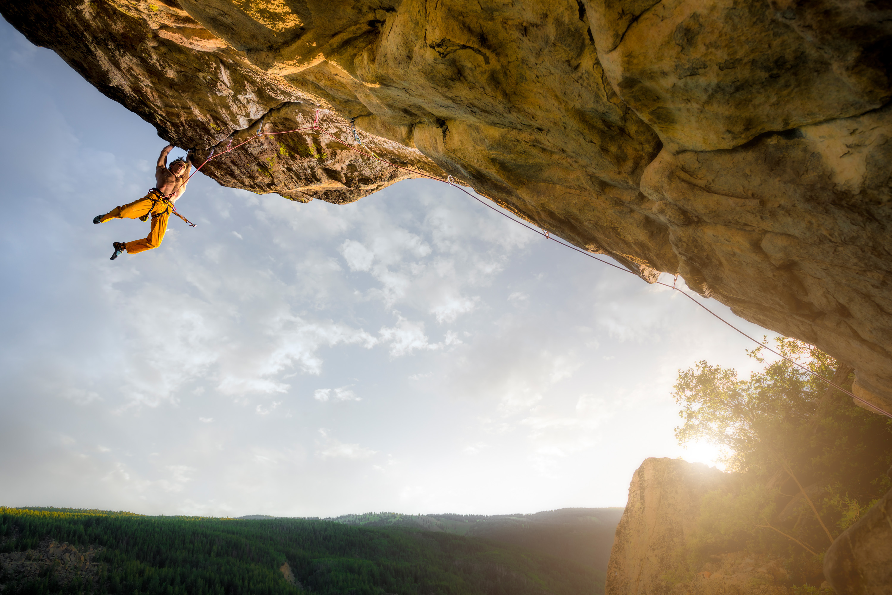 Climber Ben Rueck overhanging Independence Pass in Aspen, CO.