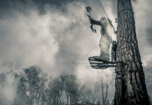 This Dramatic Photograph of a Bow Hunter Shooting from a Tree Surrounded by Mist is Part of Walls Product Launch Campaign Photos by Tyler Stableford.