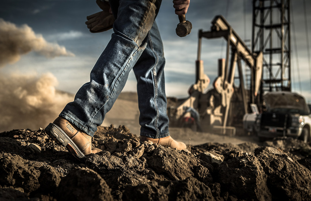 Dramatic Professionally Shot Image of an Oil Rig in Vernal, Utah Shows the Strength and Durability of Ariat Boots On the Job.