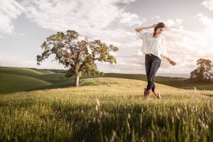 The Young Woman in this Photograph, Taken on Wide Open Ranchland, Moves Comfortably and Confidently in Western Boots and Lifestyle Apparel.