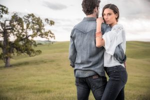 Wrangler Jeans and Casual Apparel are a Part of Western Lifestyle. Male and Female Models Pose for this Beautiful Photograph on a Western Ranch.