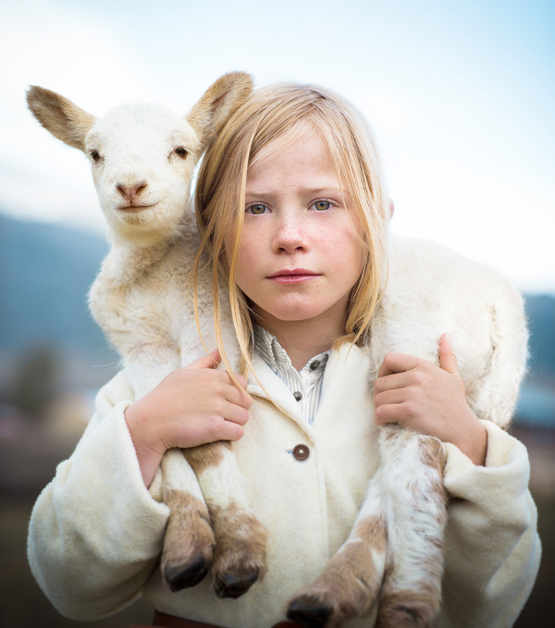 Farm life is more than a lifestyle for many generations of Colorado families. This portrait captures the spirit of loving life on a farm even from a young age.