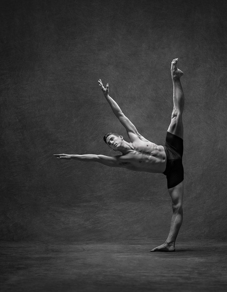 The Male Ballet Dancer in this Photograph Demonstrates His Incredible Balance and Flexibility.