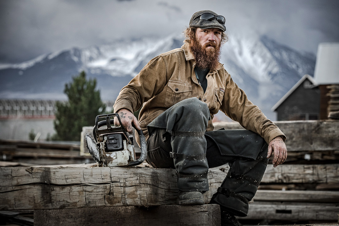 Portrait of worker at reclaimed timber mill.