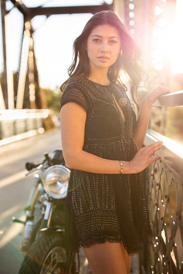 attractive woman with motorcycle at sunset with EOS R 