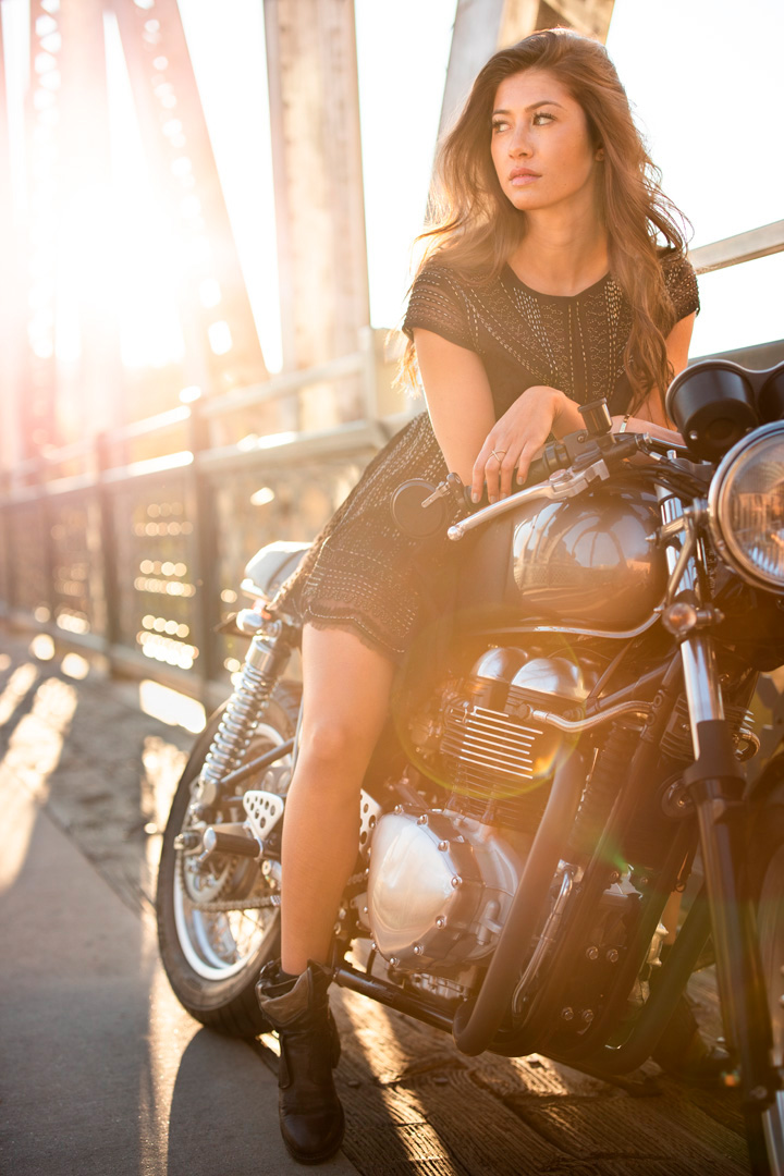 attractive woman on motorcycle at sunset with EOS R 