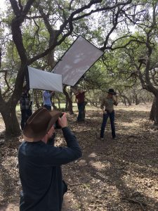 Tyler shooting a model on set in Austin, TX