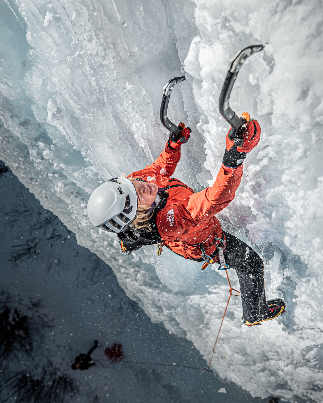 Climber Anna Pfaff ice climbing in Colorado